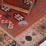 Handwoven Wool Jute Kilim Rug: Red Tribal Medallion with Fringe